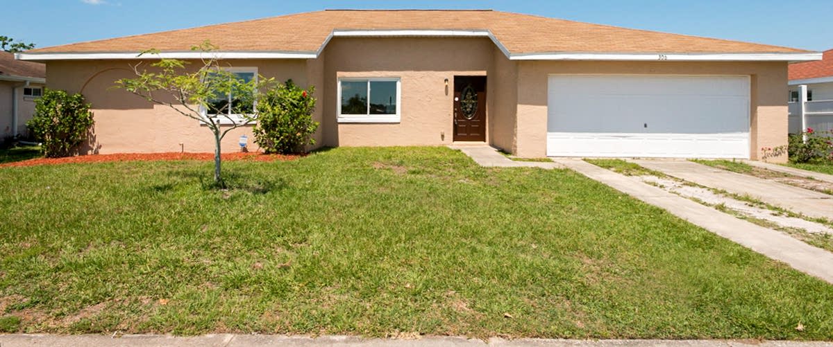 Photo 1 of 20 - 306 Buttonwood Dr, Kissimmee, FL 34743